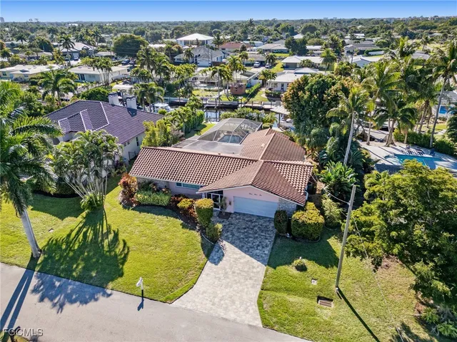an aerial view of a house with a garden