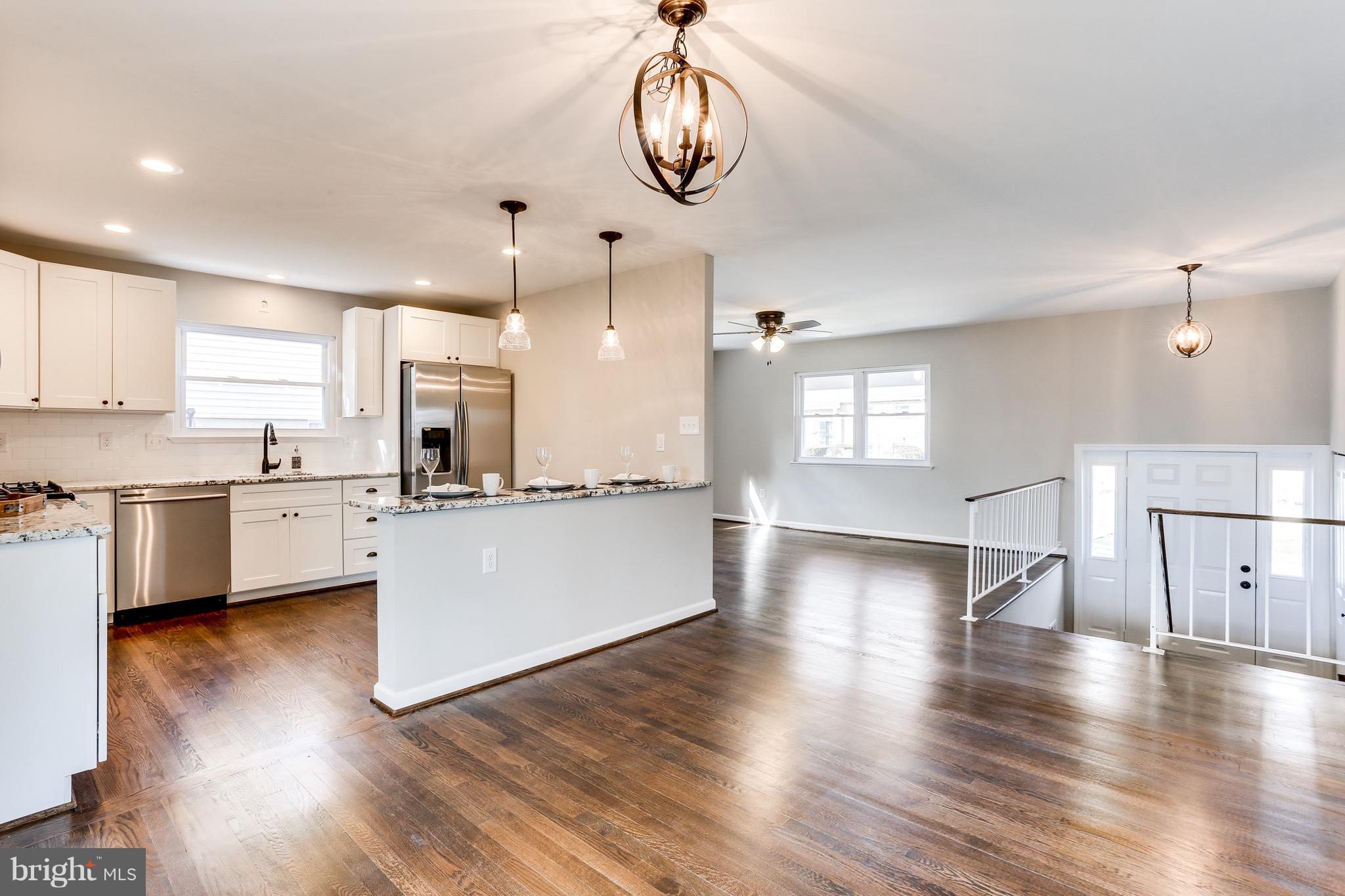 1515 Adamsview Road Baltimore, MD 21228 - Photo 3 of 26 Beautifully refinished hardwood floors upstairs.