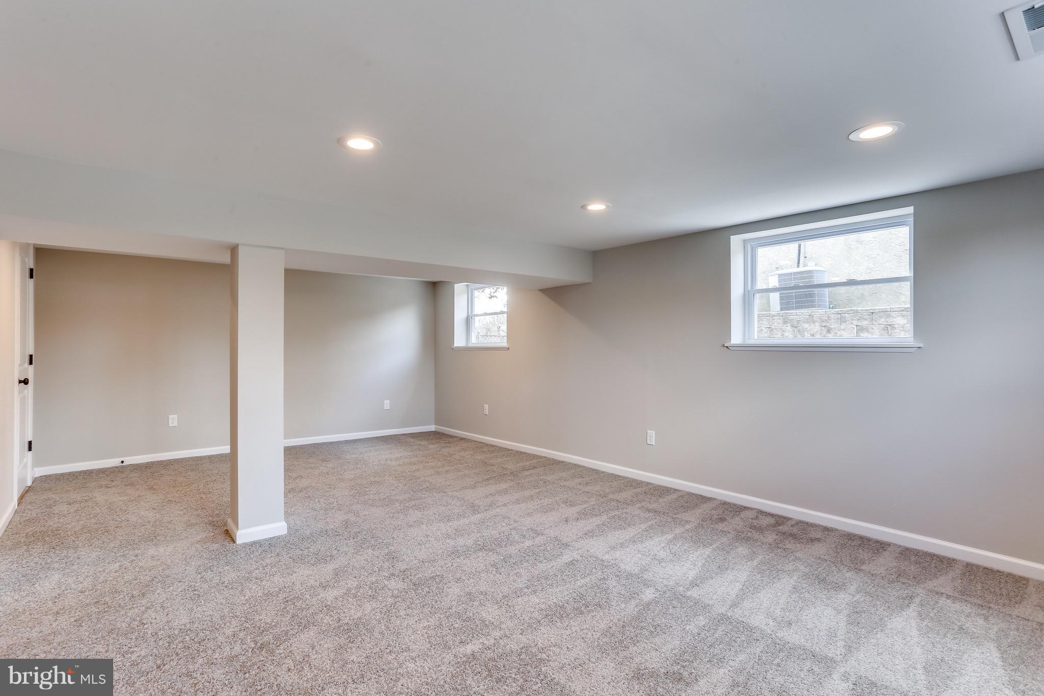 1515 Adamsview Road Baltimore, MD 21228 - Photo 21 of 26 Carpeted and ready for a sofa and tv!