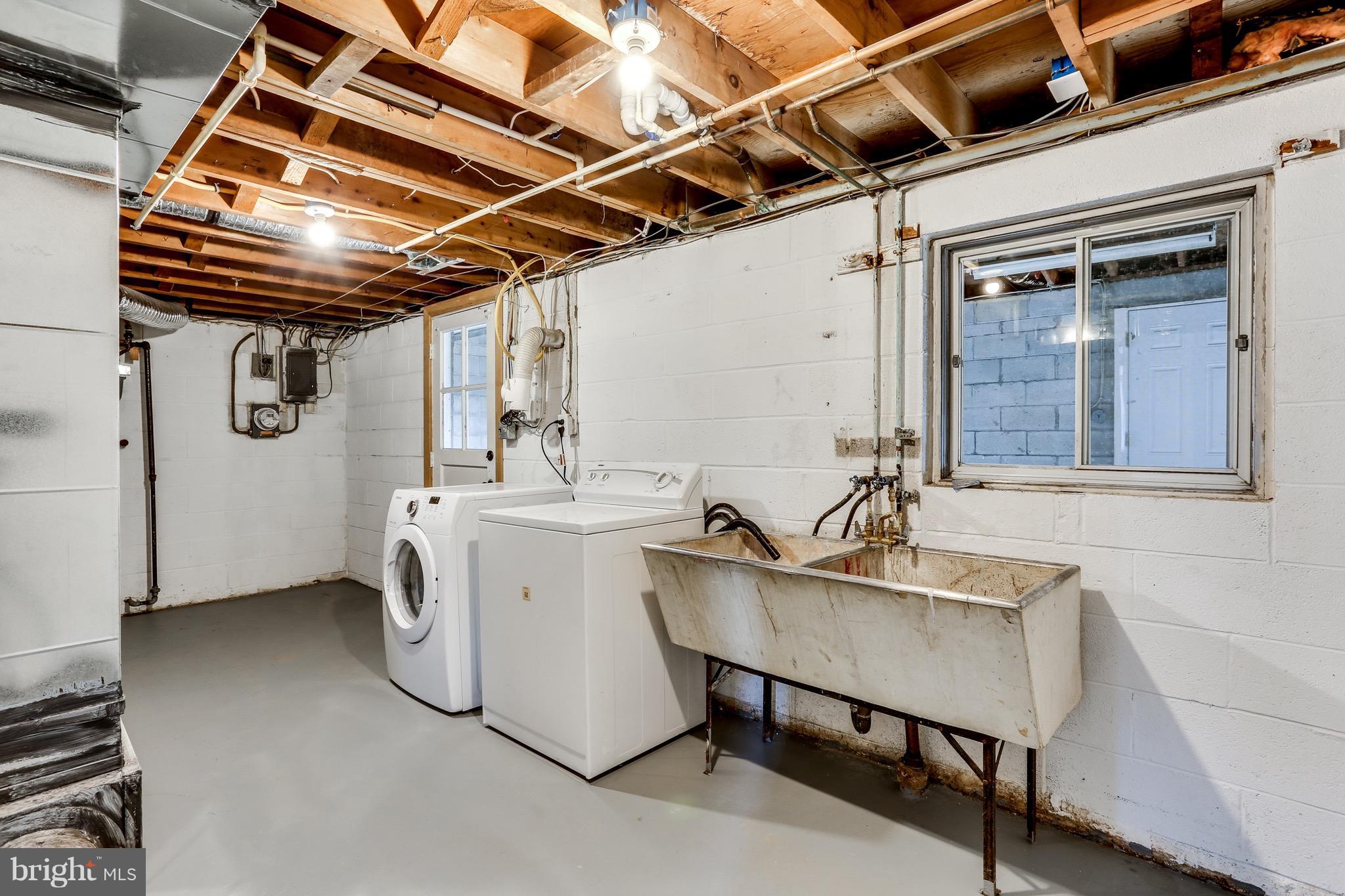 1515 Adamsview Road Baltimore, MD 21228 - Photo 23 of 26 Laundry area with oversized utility sink.