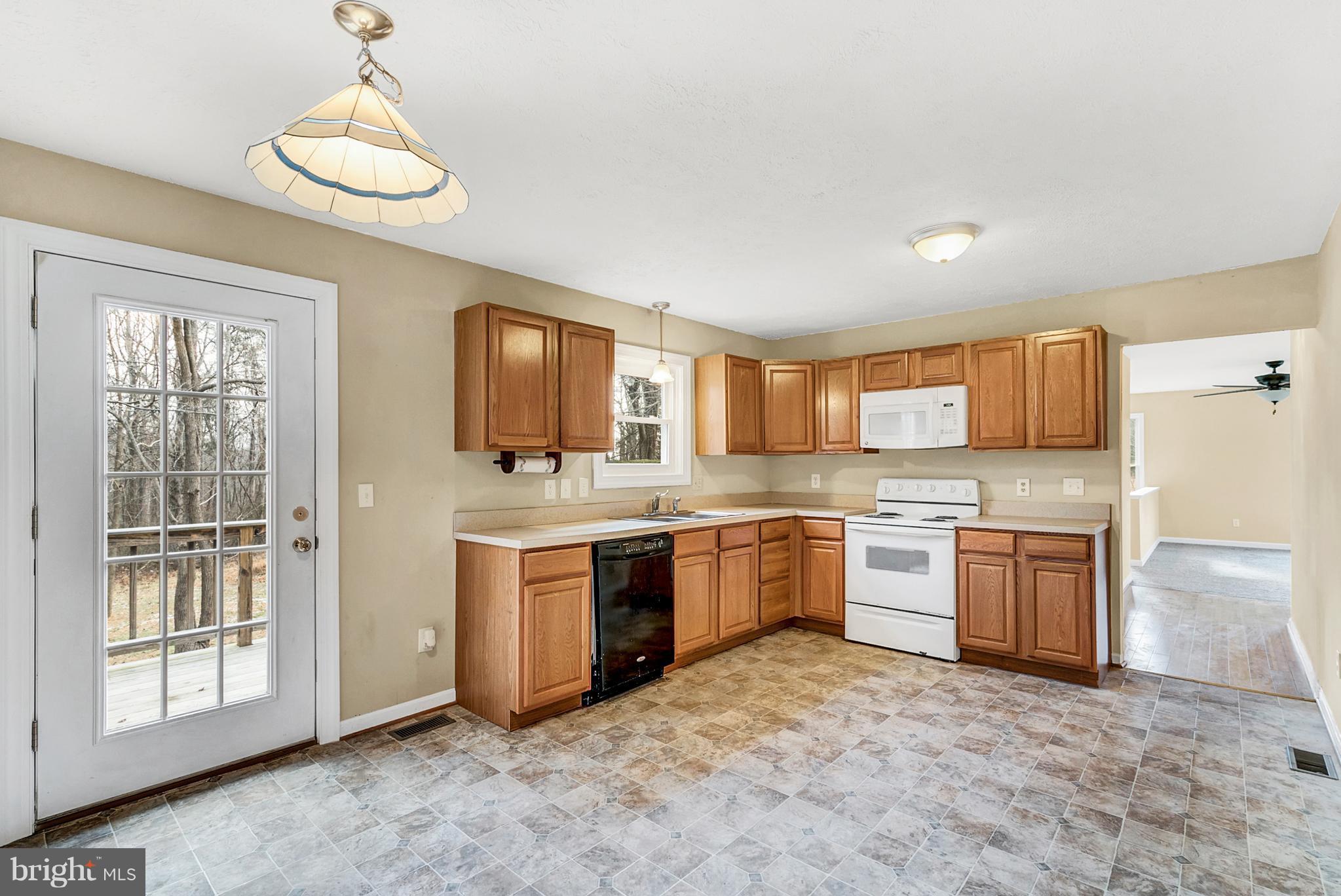 14225 Norman Road Culpeper, VA 22701 - Photo 14 of 30 Large kitchen leading out to deck