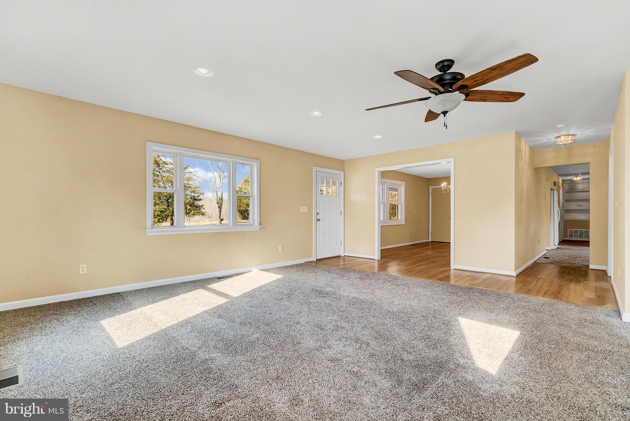 14225 Norman Road Culpeper, VA 22701 - Photo 10 of 30 Family Room leading to dining room/kitchen
