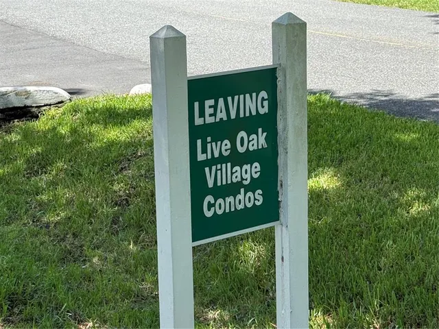 a view of a house with a large window and a window
