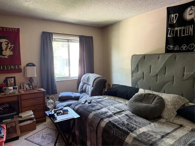 a kitchen with cabinets stainless steel appliances and a sink