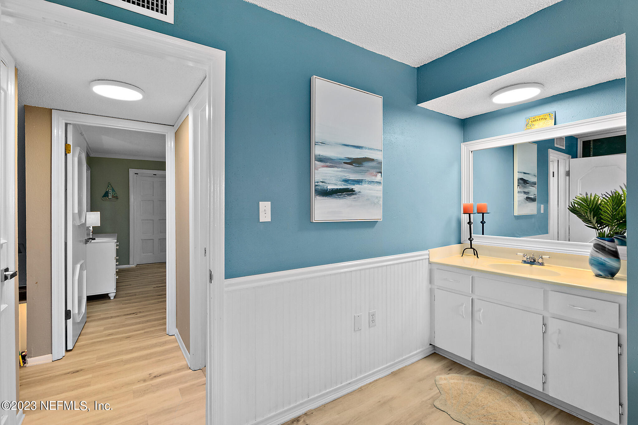 1 Ocean Trace Road, Unit 242 St. Augustine, FL 32080 - Photo 26 of 42 a view of a bathroom with sink and mirror