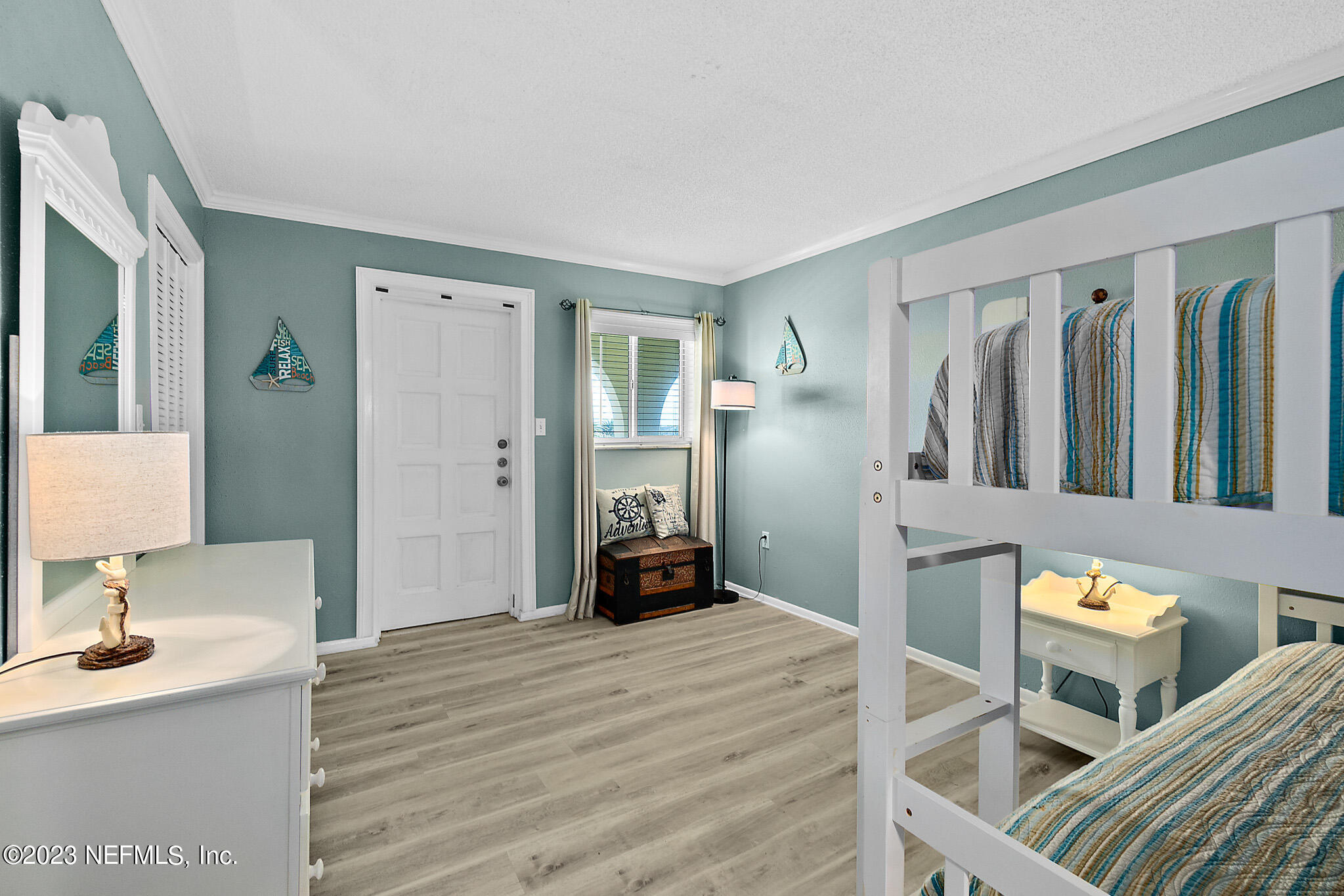 1 Ocean Trace Road, Unit 242 St. Augustine, FL 32080 - Photo 29 of 42 a bedroom with a bed and a table