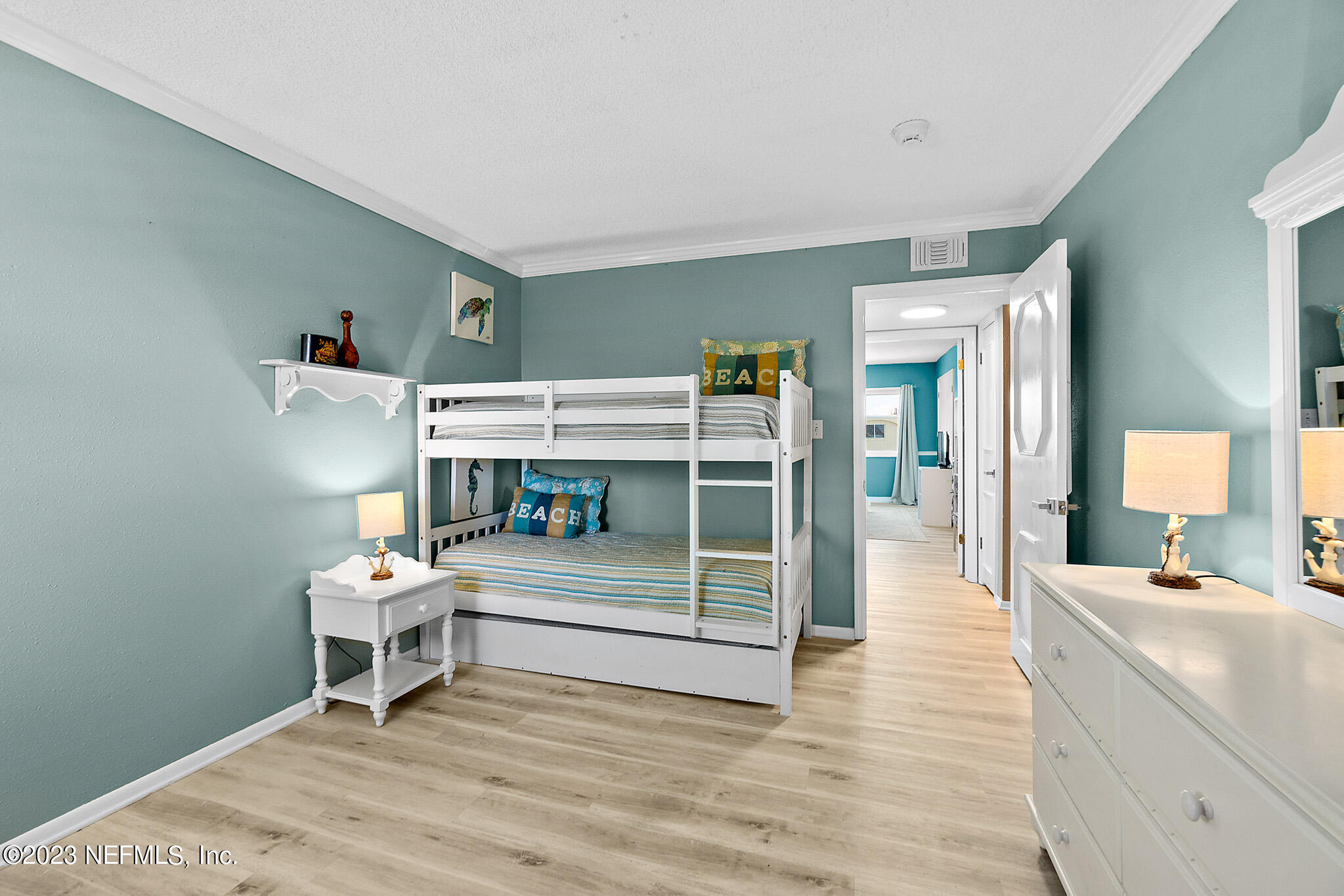 1 Ocean Trace Road, Unit 242 St. Augustine, FL 32080 - Photo 30 of 42 a bedroom with furniture and a window