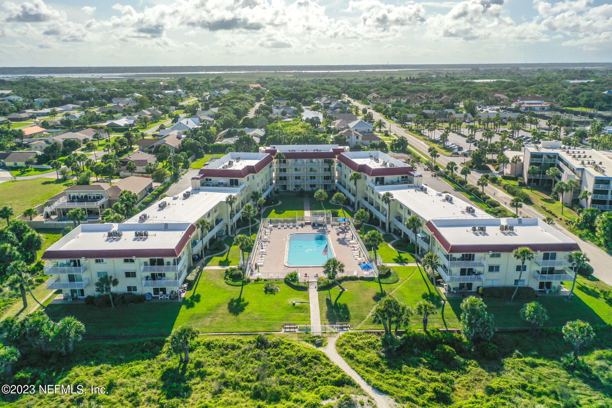 1 Ocean Trace Road, Unit 242 St. Augustine, FL 32080 - Photo 41 of 42 an aerial view of residential houses with outdoor space and trees