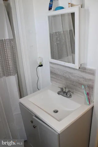 a bathroom with a sink and a vanity