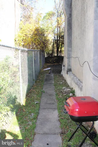 a view of a backyard with furniture