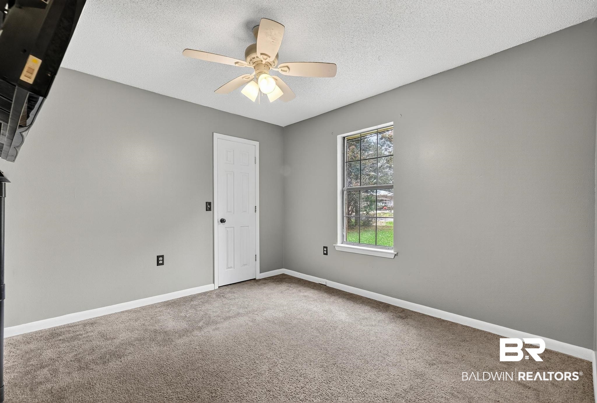 21895 2nd Street Silverhill, AL 36576 - Photo 35 of 43 Bedroom with carpet and a ceiling fan
