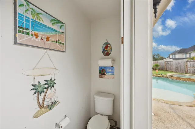 a bathroom with a toilet and a sink