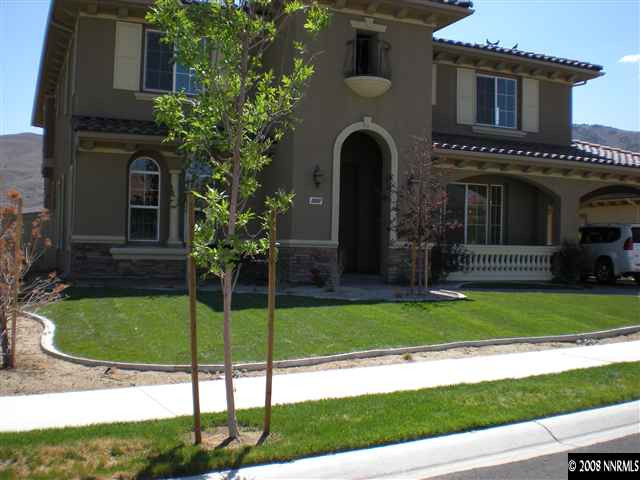 10010 Burghley Lane Reno, NV 89521 - Photo 1 of 9 a front view of a house with garden