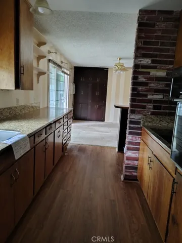 a view of an entryway door and hallway