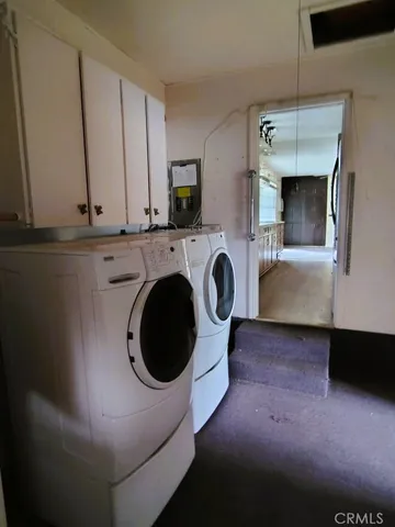 a view of a kitchen with washing machine