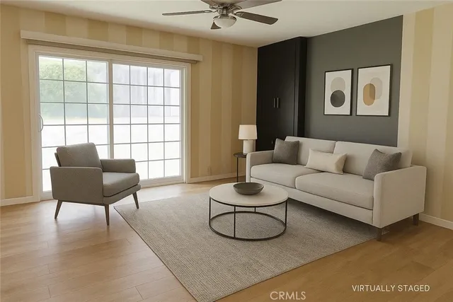 a living room with furniture and a window