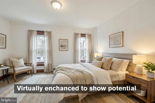 a bedroom with a bed and window