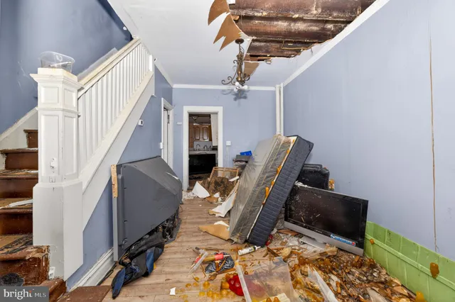 a view of workspace with wooden floor and windows