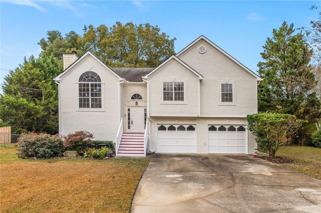 5315 Moon Road Powder Springs, GA 30127 - Photo 1 of 1 a view of front of a house with a yard
