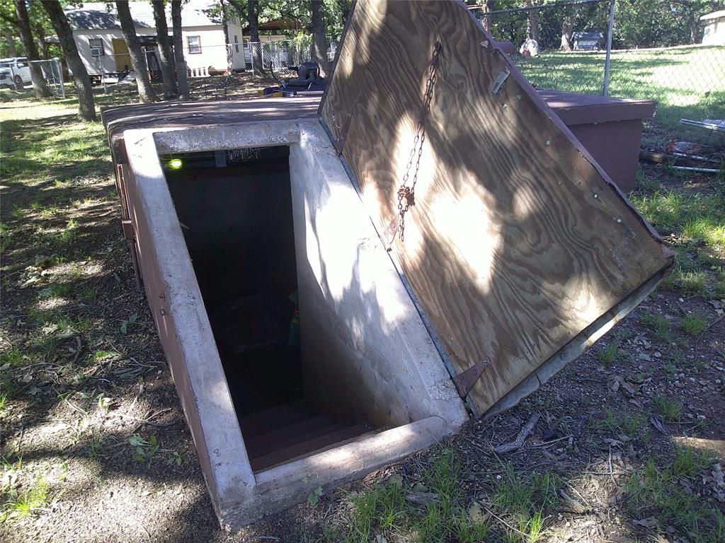 999 Roberts Cut Off Road Bowie, TX 76230 - Photo 11 of 17 a view of a yard from a balcony