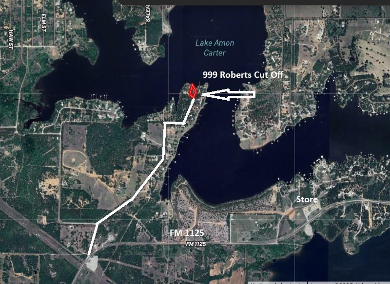 999 Roberts Cut Off Road Bowie, TX 76230 - Photo 17 of 17 a vase of flowers sitting on a table