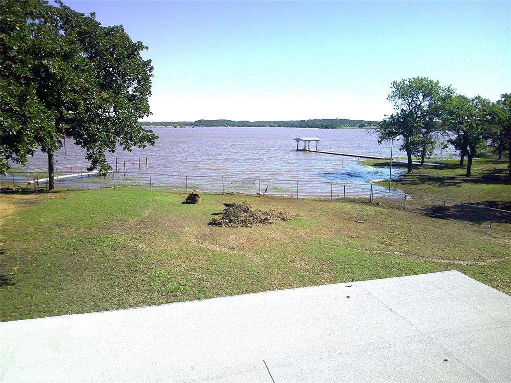 999 Roberts Cut Off Road Bowie, TX 76230 - Photo 8 of 17 a view of an outdoor space and swimming pool