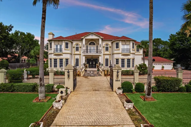 a view of multiple houses with a yard
