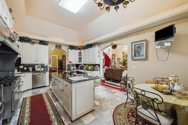 a room with furniture and flat screen tv