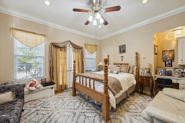 a bed room with a bed and a couch