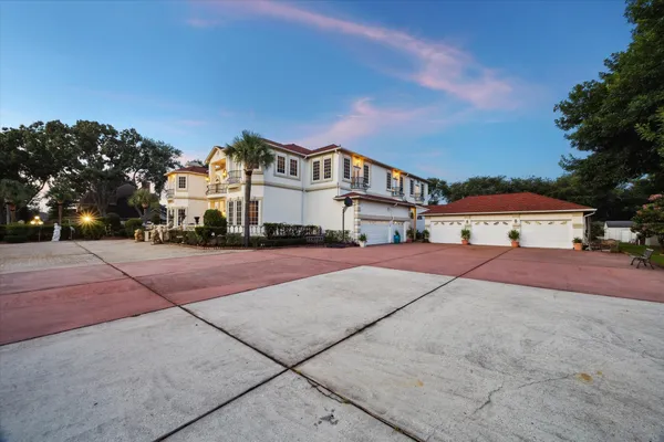 a view of multiple houses with a yard