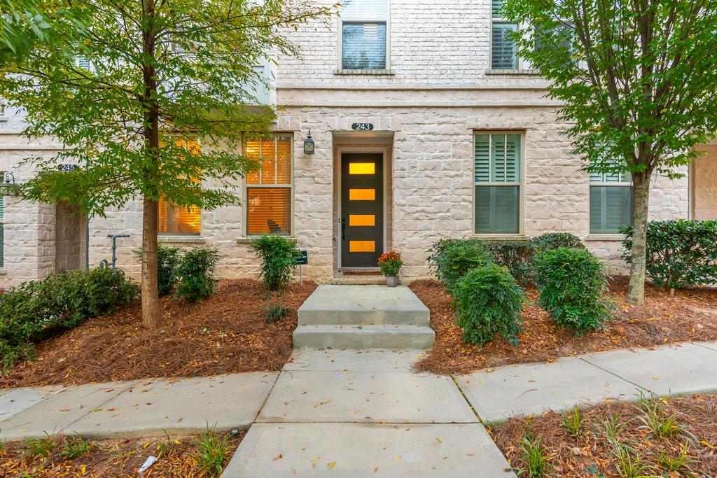 243 Franklin Road Sandy Springs, GA 30342 - Photo 1 of 1 a front view of a house with garden