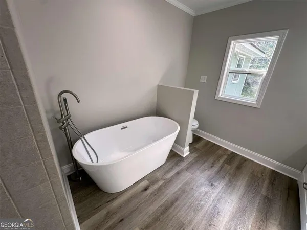 a view of a bathtub in a bathroom