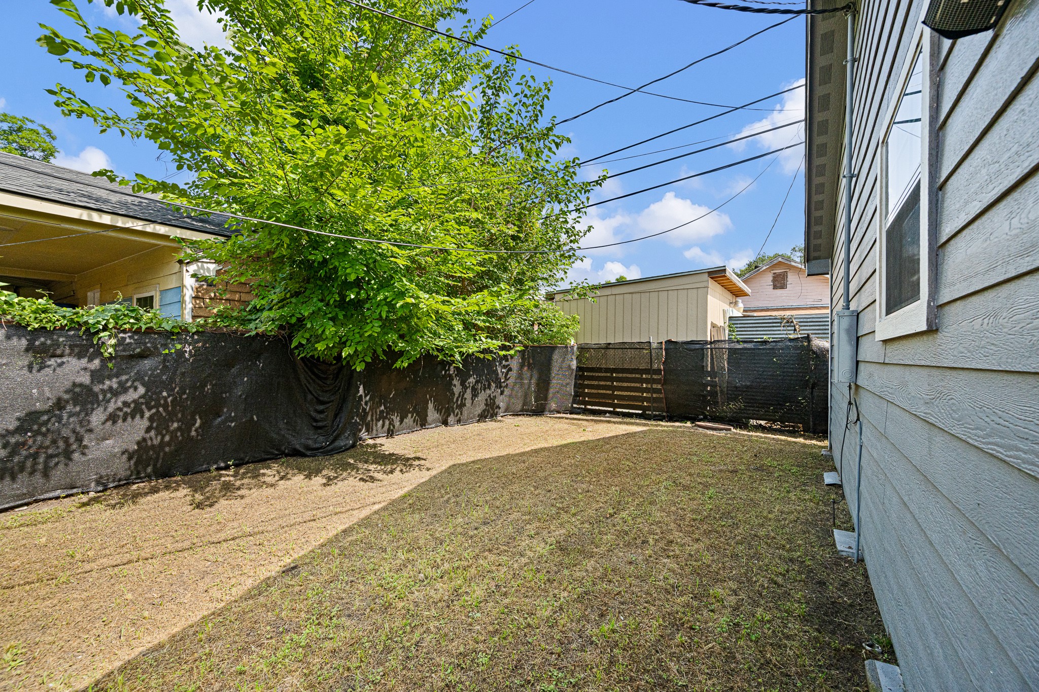 7815 Harding Street, Unit B Houston, TX 77012 - Photo 4 of 21 Discover a cozy, private yard perfect for relaxation and outdoor enjoyment offering ample space for your personal touch.
