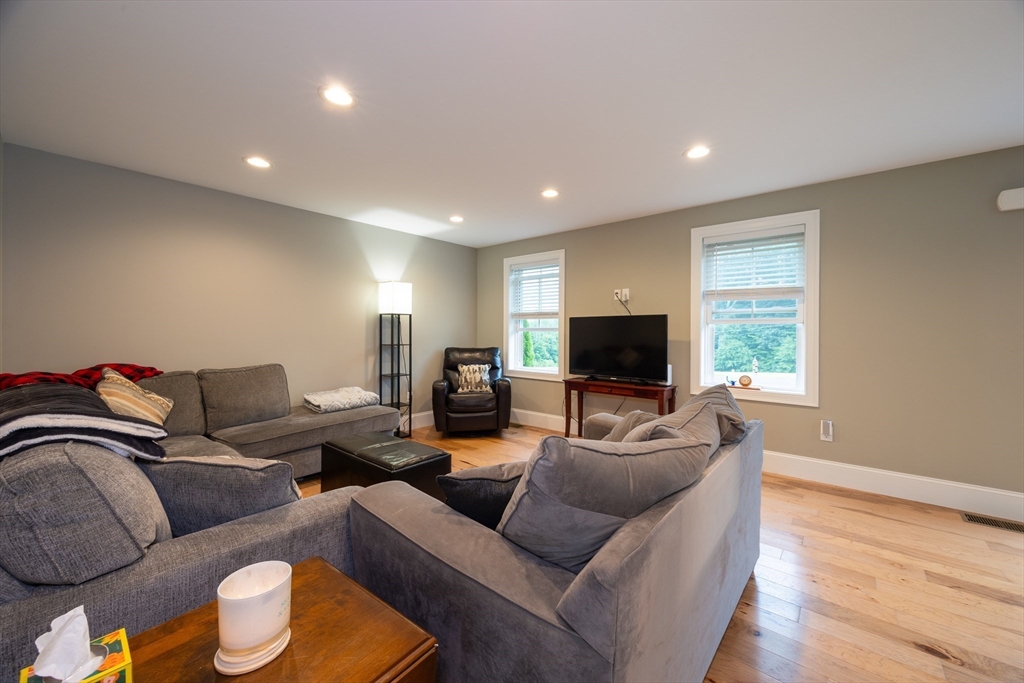 194 A Narrows Road Westminster, MA 01473 - Photo 18 of 31 a living room with furniture and a flat screen tv