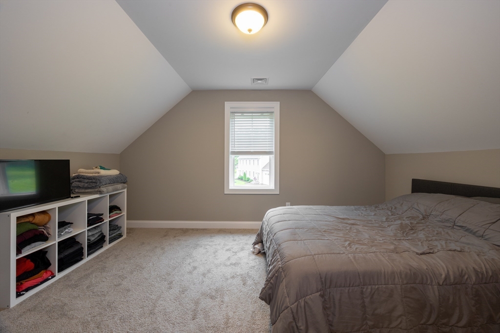 194 A Narrows Road Westminster, MA 01473 - Photo 29 of 31 a bedroom with a bed and a flat screen tv