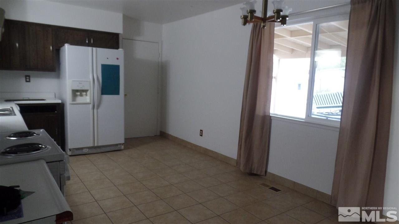 8900 Turbine Way Reno, NV 89506 - Photo 11 of 19 a view of an empty room with a window