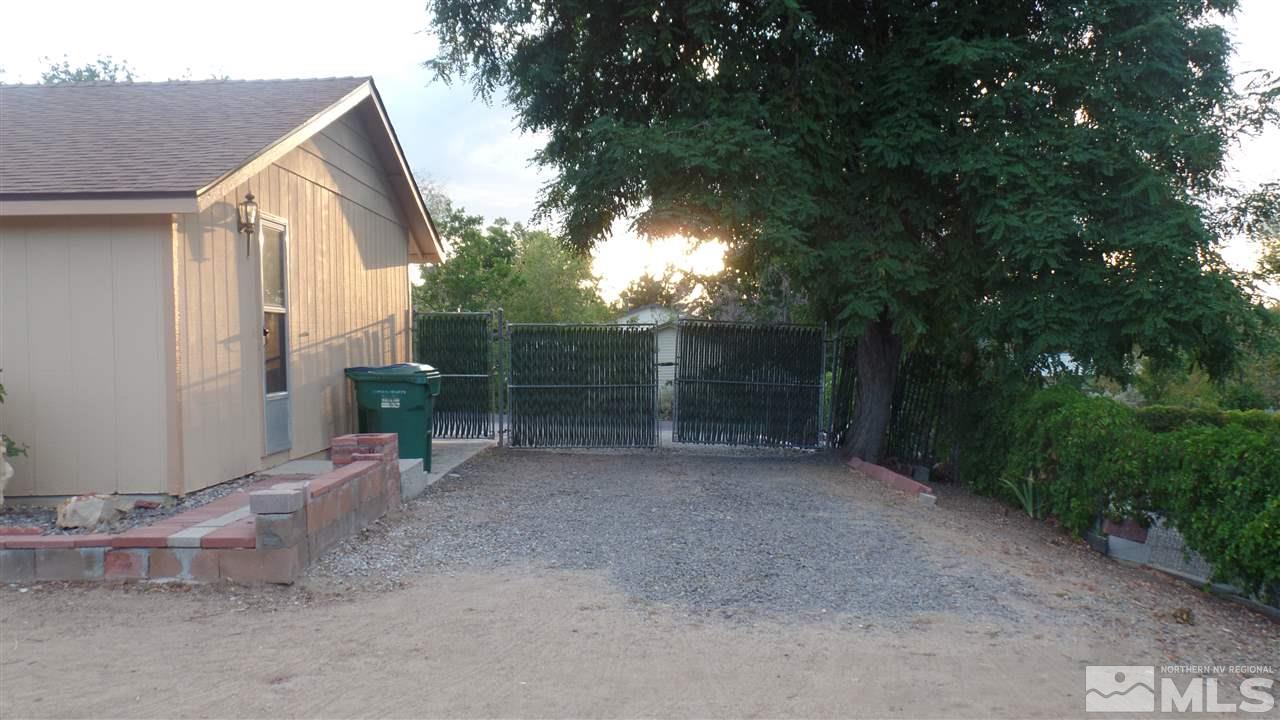 8900 Turbine Way Reno, NV 89506 - Photo 17 of 19 a backyard of a house with table and chairs