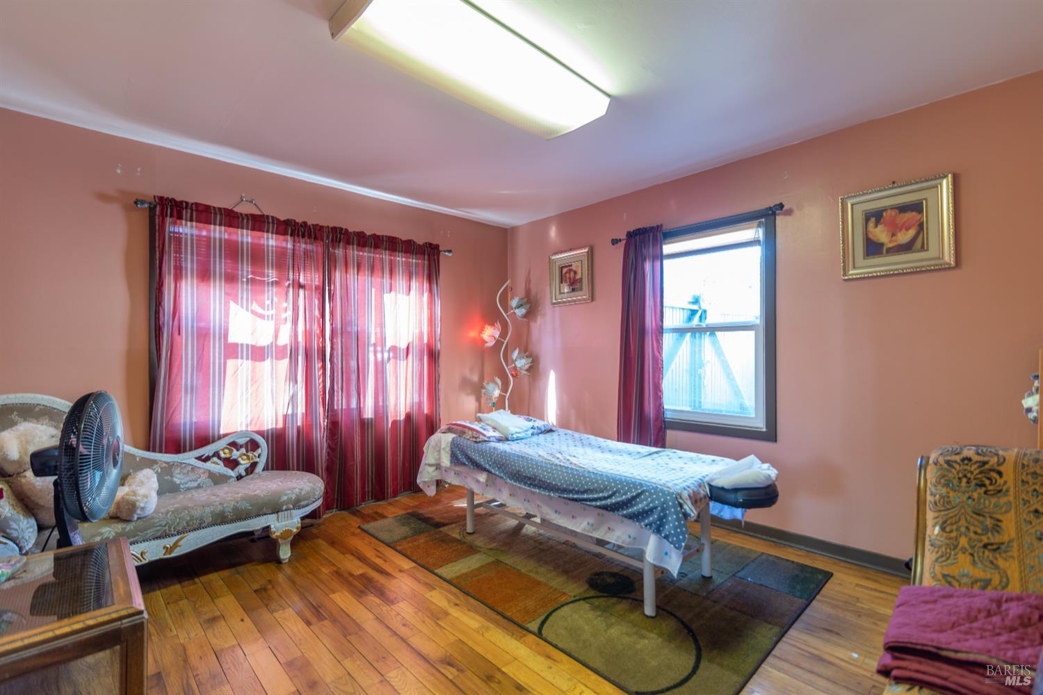 1818 4th Street Santa Rosa, CA 95404 - Photo 17 of 39 a living room with furniture and a window