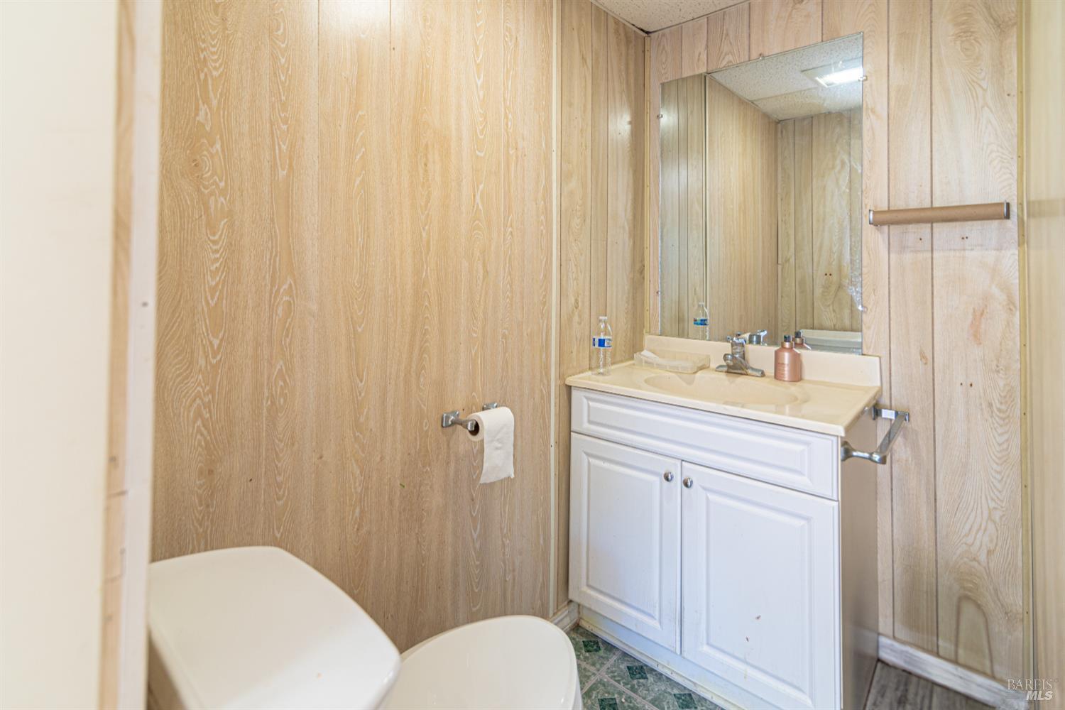 1818 4th Street Santa Rosa, CA 95404 - Photo 31 of 39 a bathroom with a sink a toilet and shower