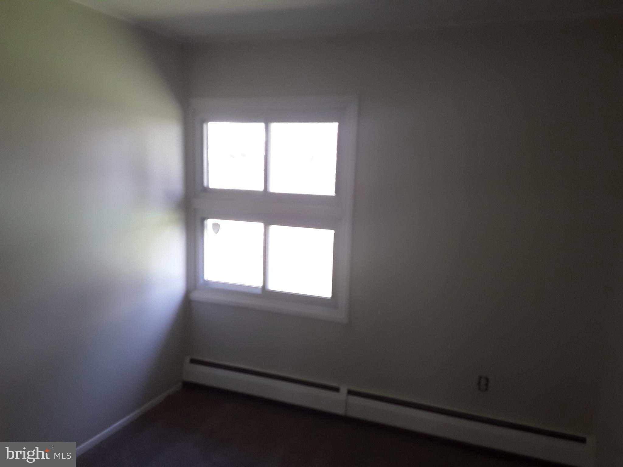 60 Gamewood Road Levittown, PA 19057 - Photo 5 of 10 an empty room with a window