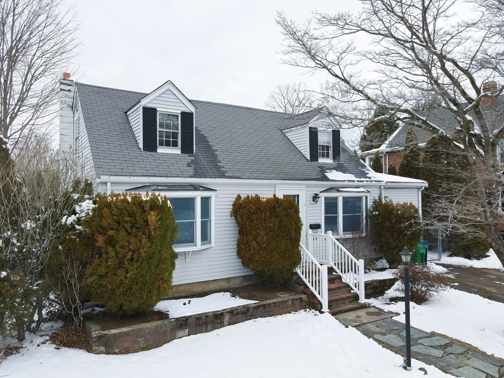 17 Kilburn Road Newton, MA 02465 - Photo 1 of 24 a front view of a house with garage