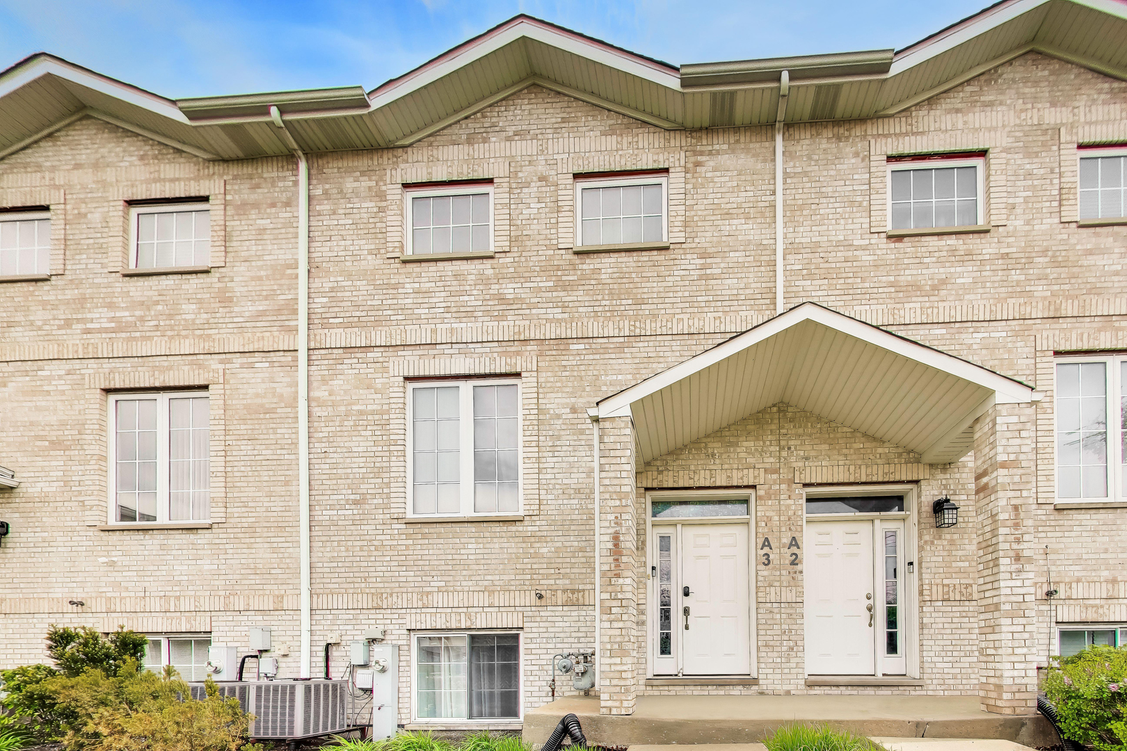 183 East River Road, Unit A3 Des Plaines, IL 60016 - Photo 1 of 21 a front view of a house