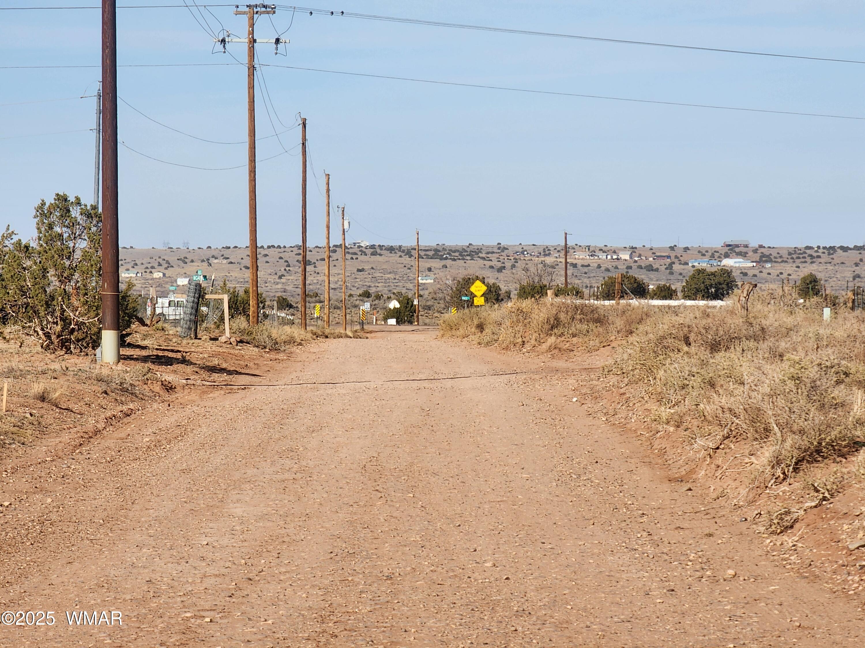 4726 Hay Hollow Road Snowflake, AZ 85937 - Photo 14 of 14 a view of a road with a building in the background
