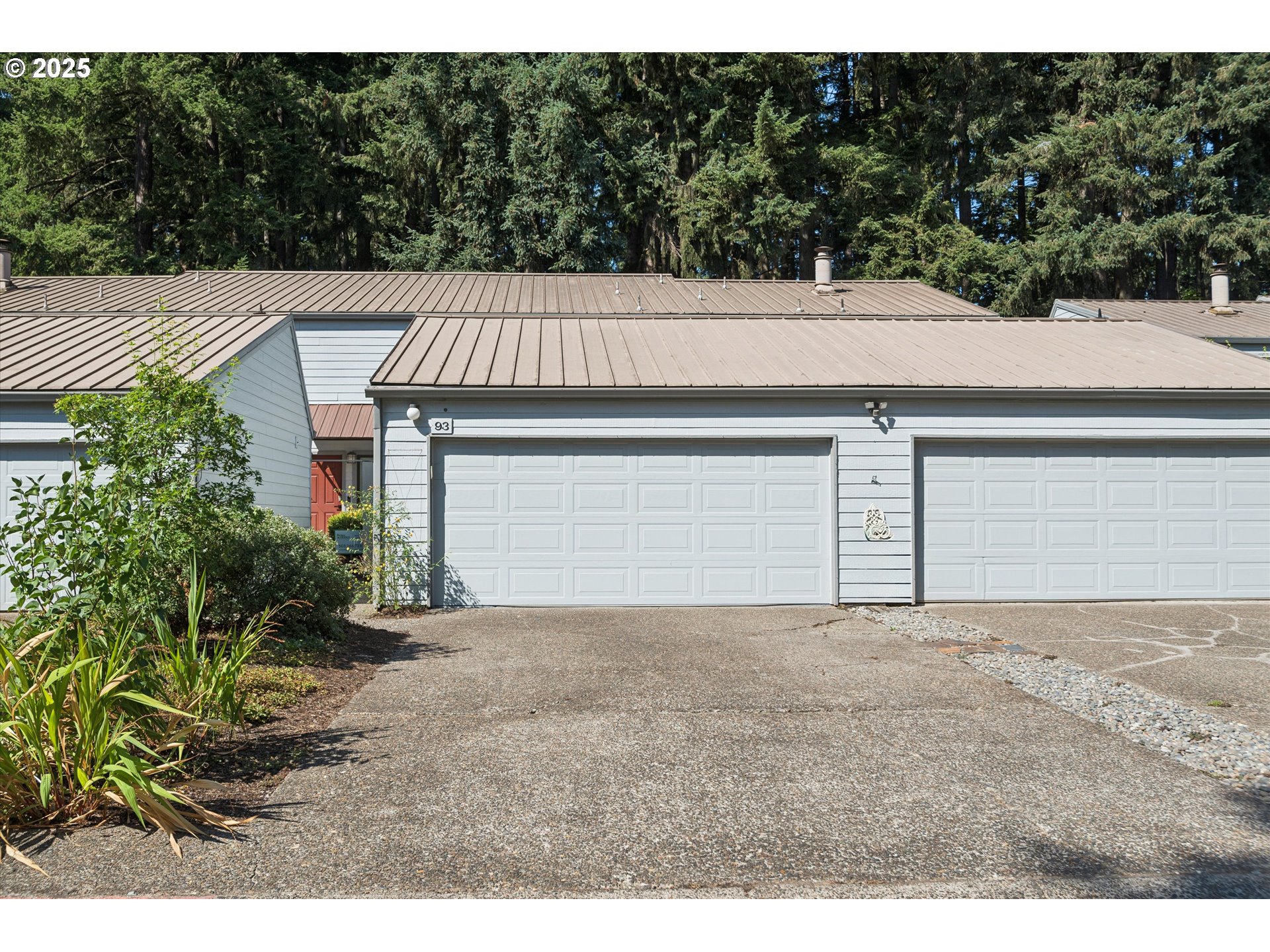 1200 Northeast Territorial Road, Unit 93 Canby, OR 97013 - Photo 1 of 36 a view of a yard with potted plants