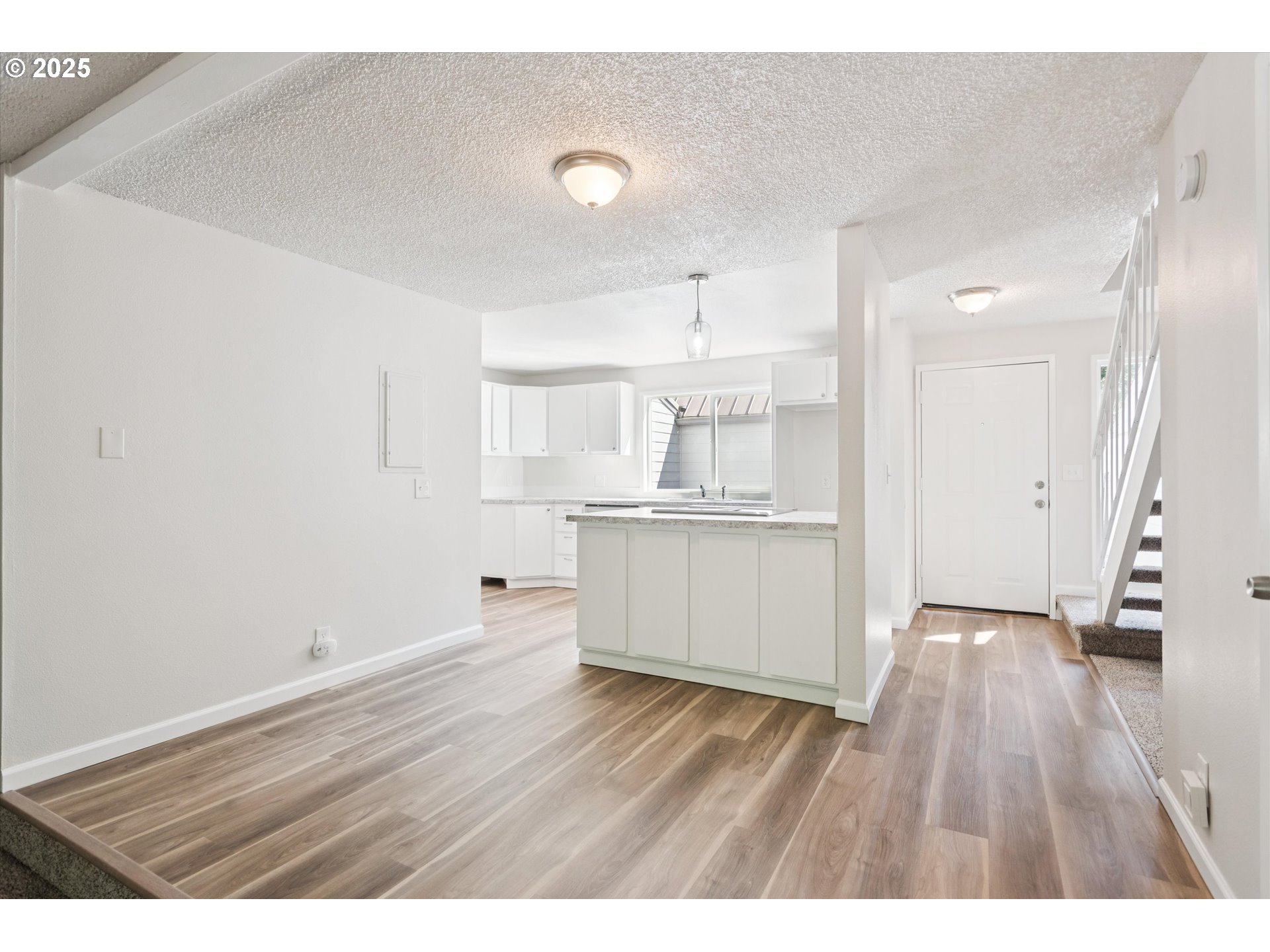 1200 Northeast Territorial Road, Unit 93 Canby, OR 97013 - Photo 12 of 36 a view of kitchen with wooden floor