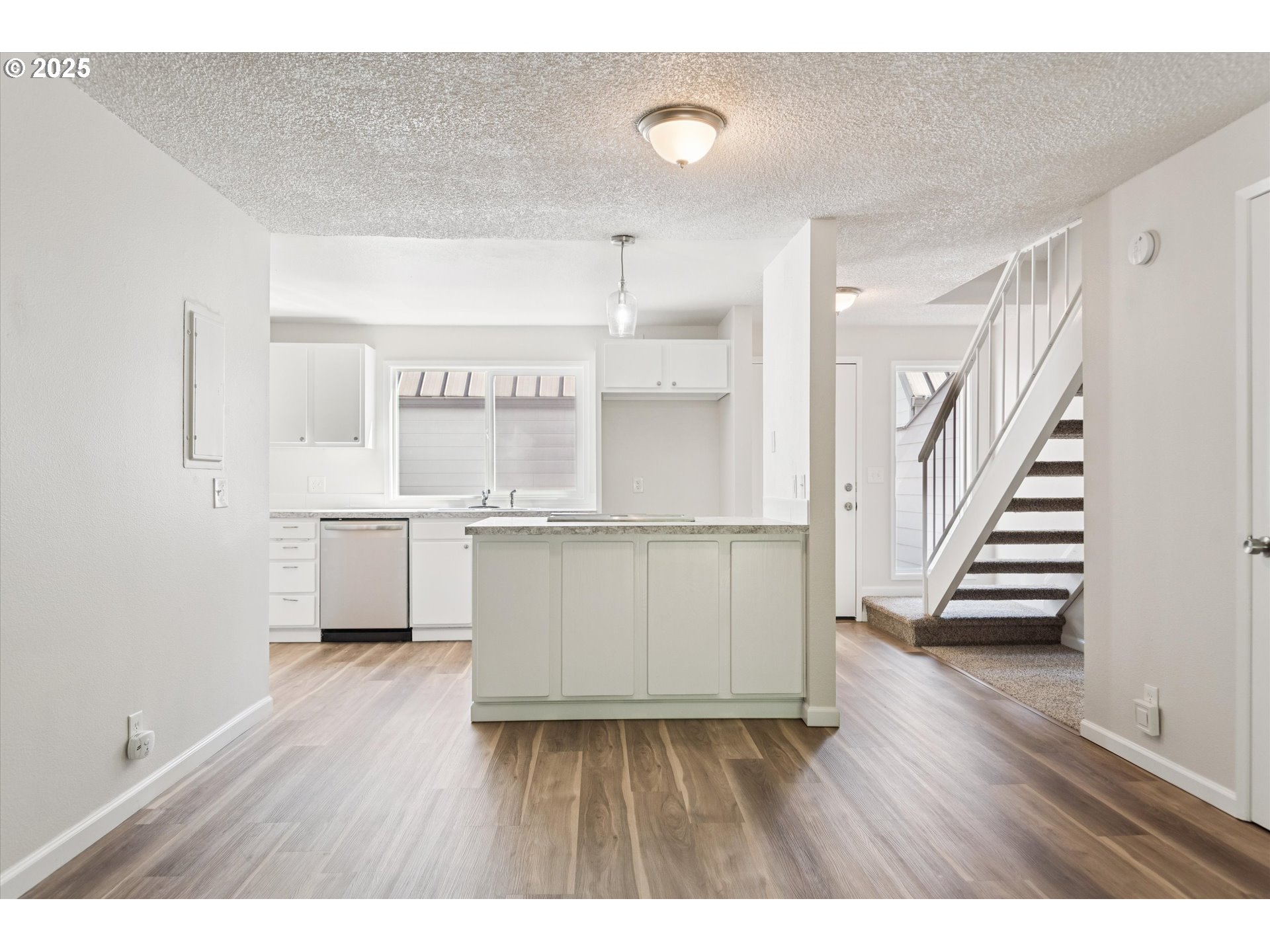 1200 Northeast Territorial Road, Unit 93 Canby, OR 97013 - Photo 13 of 36 a view of kitchen with wooden floor
