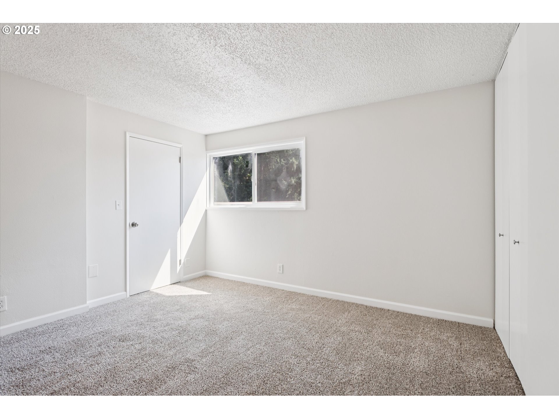 1200 Northeast Territorial Road, Unit 93 Canby, OR 97013 - Photo 20 of 36 an empty room with windows