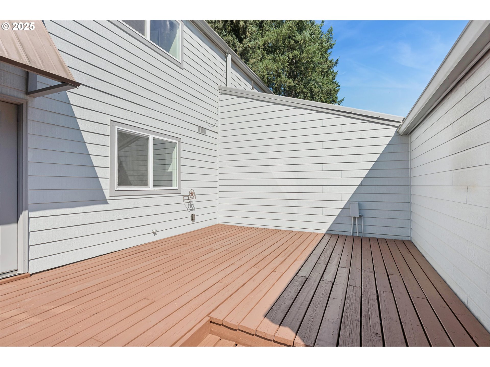 1200 Northeast Territorial Road, Unit 93 Canby, OR 97013 - Photo 2 of 36 a view of wooden deck