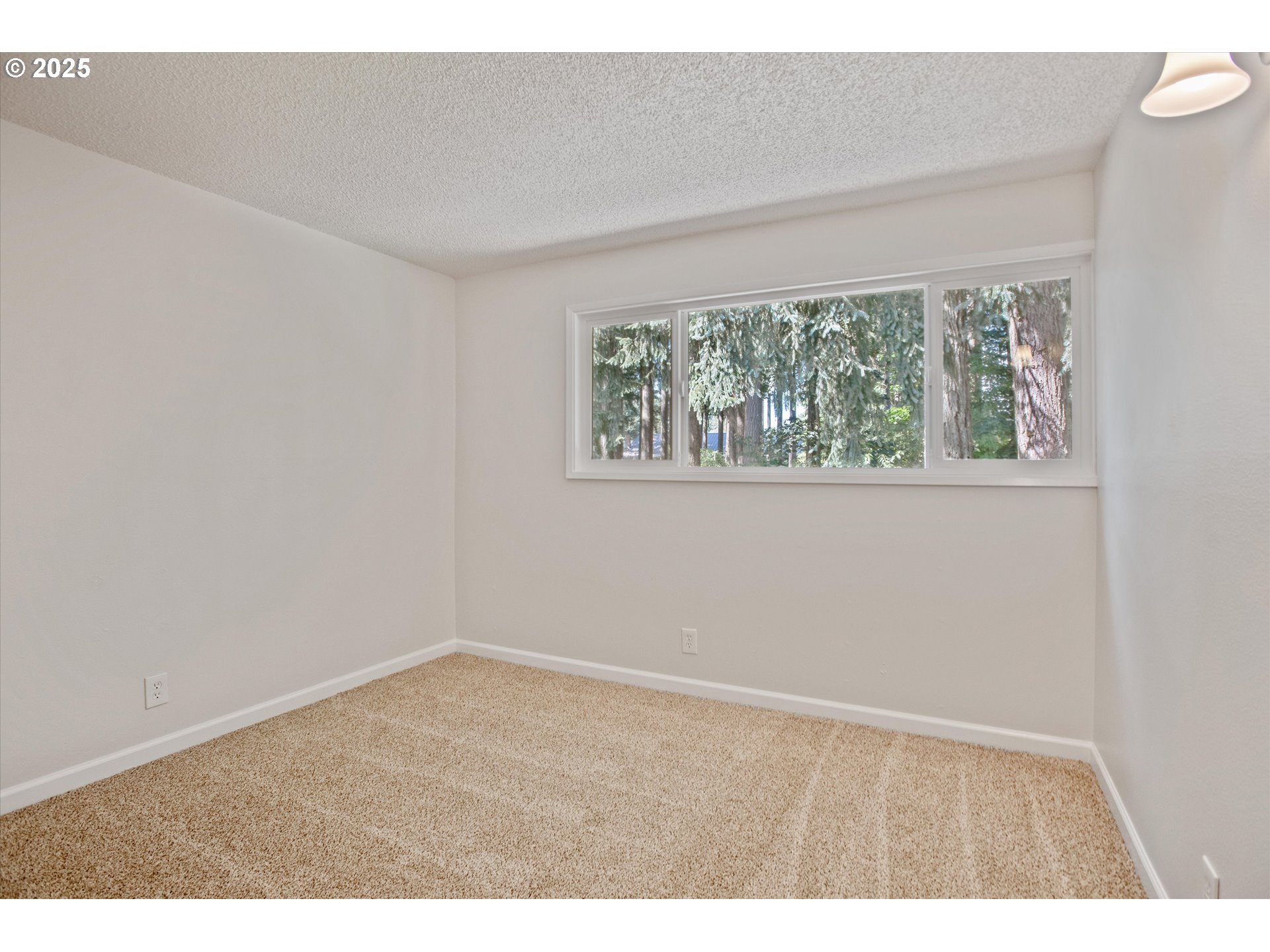 1200 Northeast Territorial Road, Unit 93 Canby, OR 97013 - Photo 25 of 36 an empty room with a window