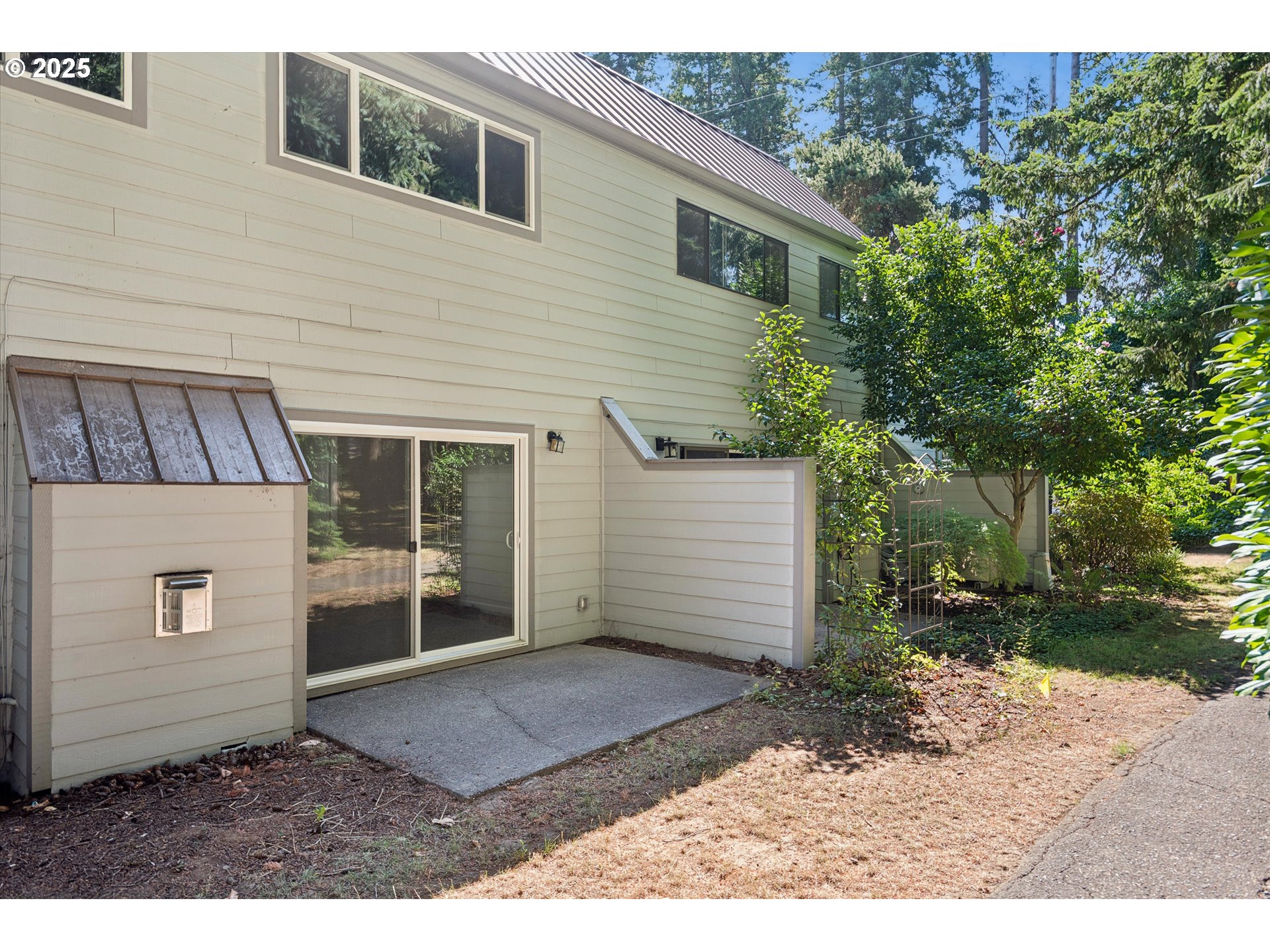 1200 Northeast Territorial Road, Unit 93 Canby, OR 97013 - Photo 32 of 36 a view of a house with a yard